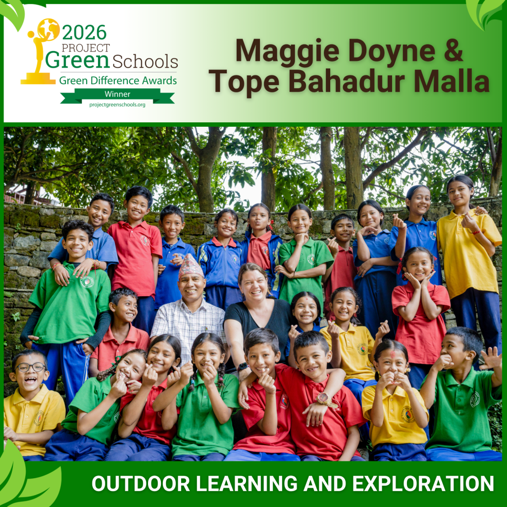 A man and woman are surrounded by smiling children in polo shirts that are green, blue, red, and yellow. A natural tree scene is the backdrop.